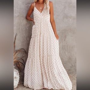 Cream colors maxi dress with gold accents.